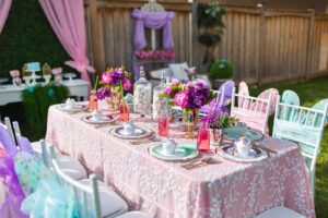 Butterfly theme table with colorful flowers and butterflies