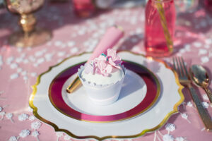 pink flower cupcake on a plate